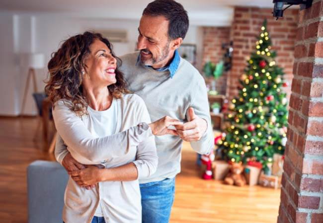 A man and a woman dancing in Christmas
